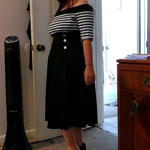 Knockout 1960s style off the shoulder ladies dress